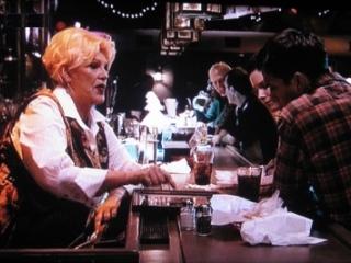 Maggie (Bonnie) makes a point to Jake (Ashton Kutcher)